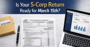 Form 1120-S filing guide 2026 showing IRS S-Corporation tax return documents on a professional desk with laptop